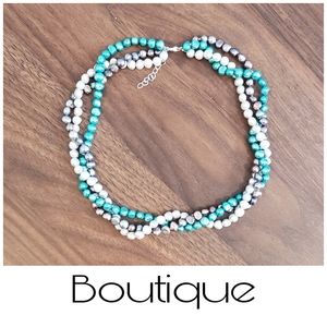 {HP} Triple strand of colored freshwater pearls